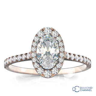 Oval Cut Graduated Halo Diamond Engagement Ring (0.89ct tw)